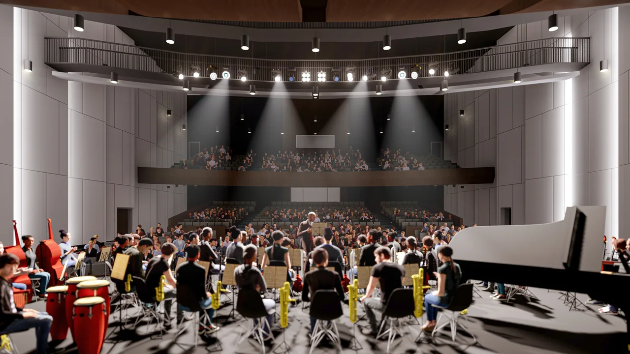 An orchestra performing on the stage of the completed auditorium.